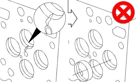 Головка блока цилиндров с трещиной - трещина проходит через седло клапана или за него